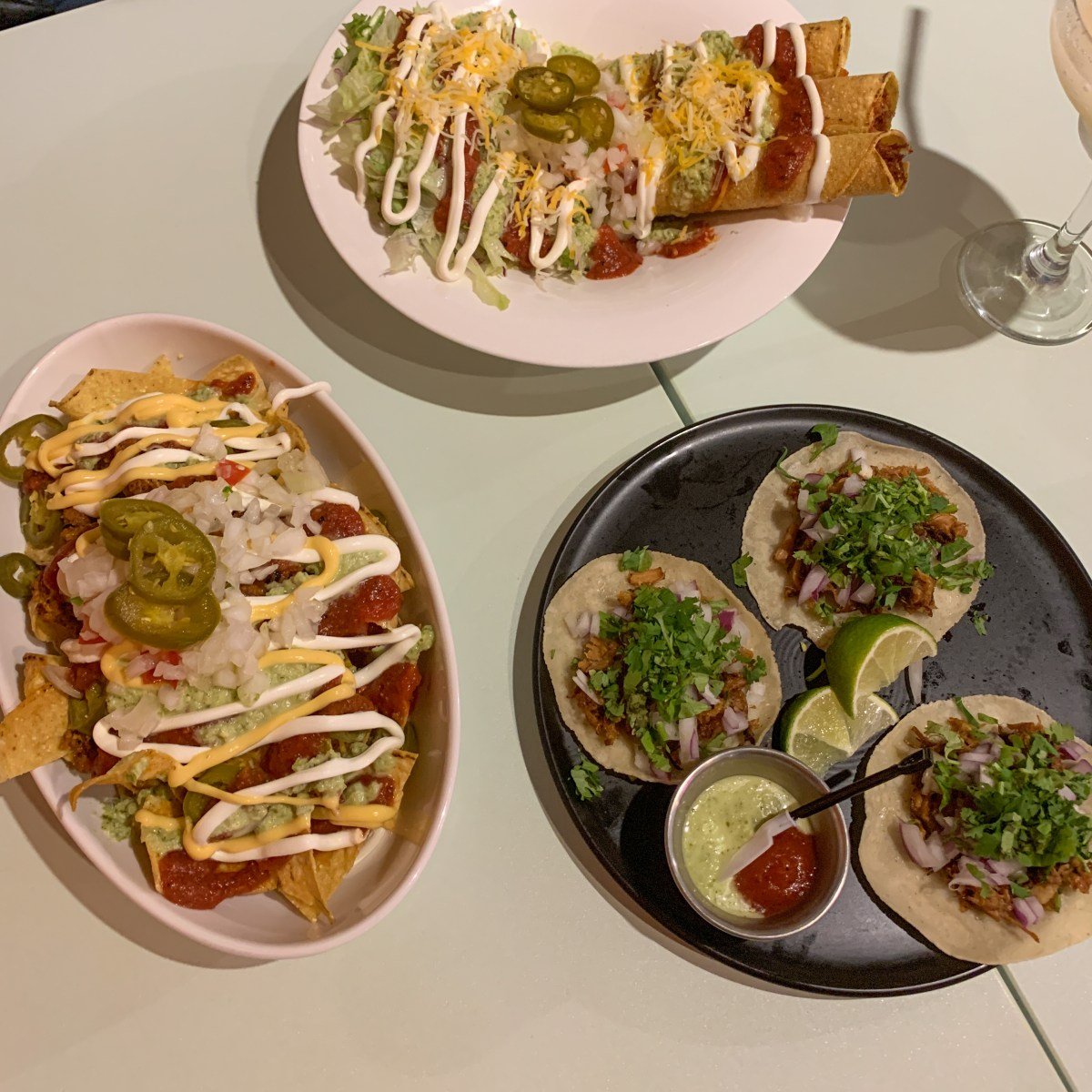 Ahorita the best taco shop in Gwangju. Pictured Nachos, Carne Asada tacos, and Taquitos