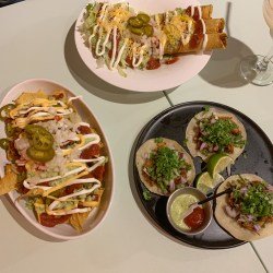 Ahorita the best taco shop in Gwangju. Pictured Nachos, Carne Asada tacos, and Taquitos