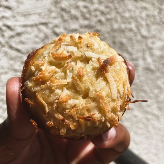 Banana Coconut Muffin photographed outside in the sunlight