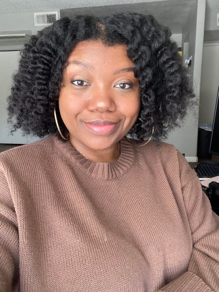 FoodieBrie Selfie wearing a brown sweater